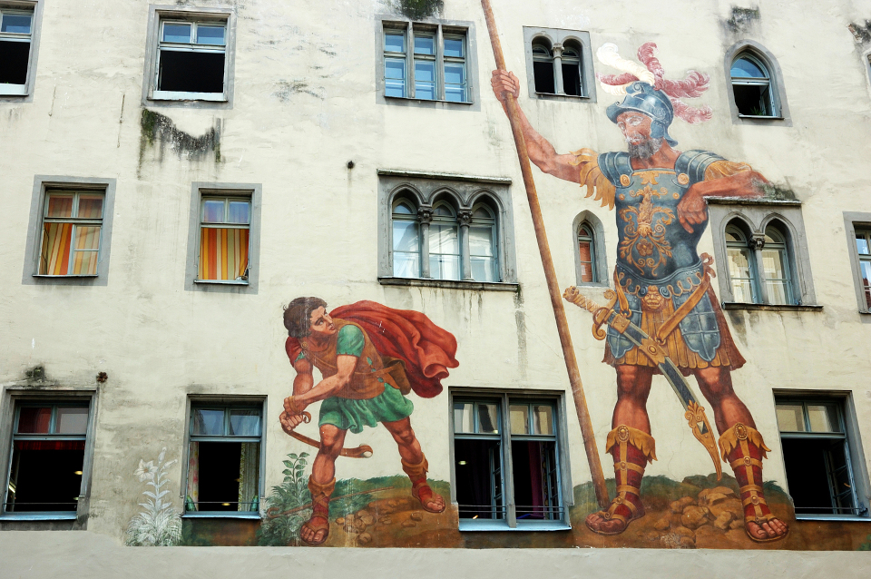 David and Goliath on the house wall Regensburg,unesco heritage site