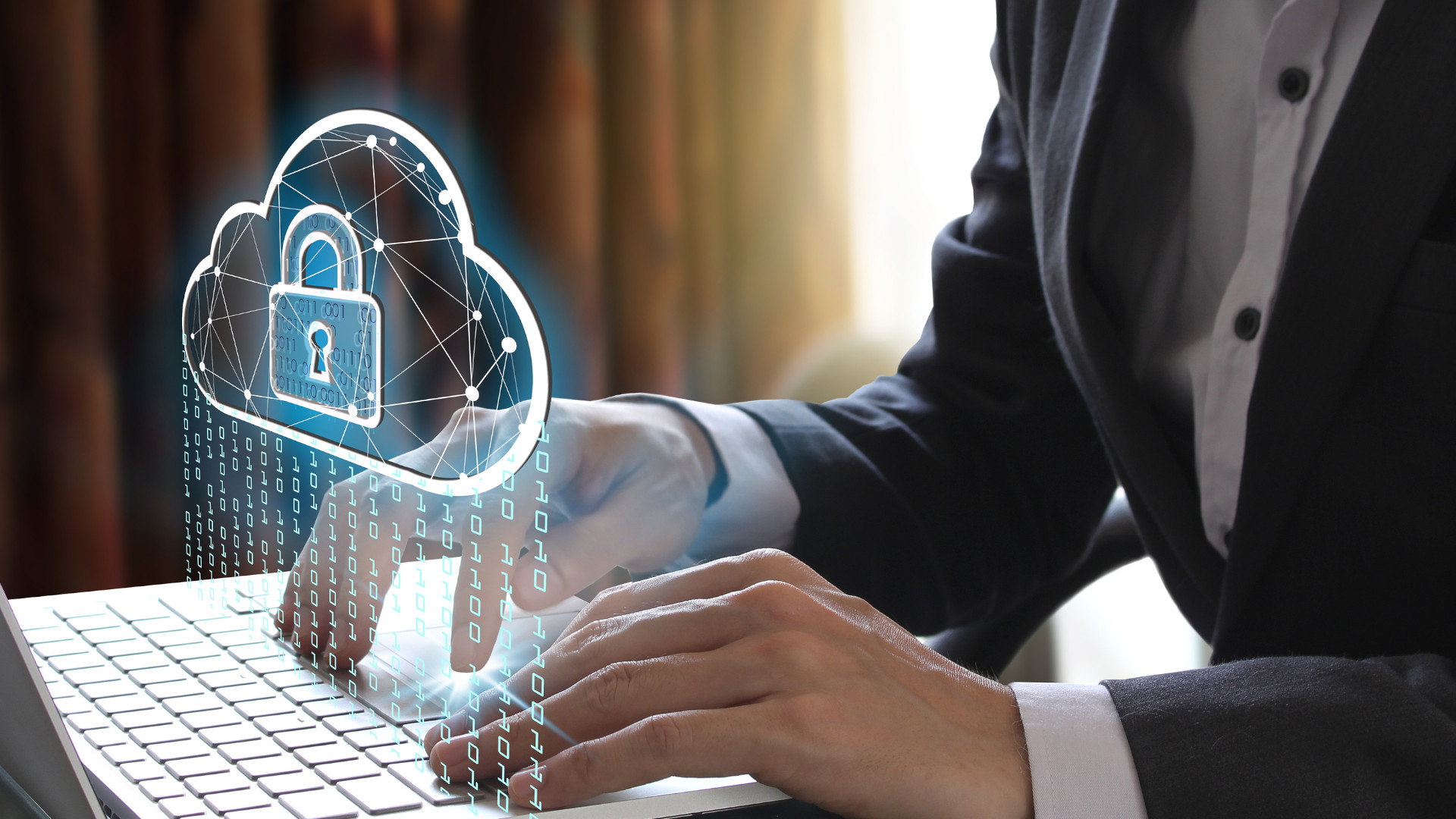 Symbolbild: mann sitzt vor dem Laptop und ein Schloss in einer Wolke erscheint